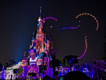 disneyland paris guide, review, frugal mum family photo, castle light show with mickey mouse ears in sky