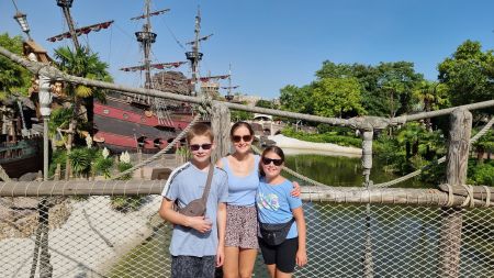disneyland paris guide, review, frugal mum family photo, pirates of the caribbean ship, frugal mum and children smiling