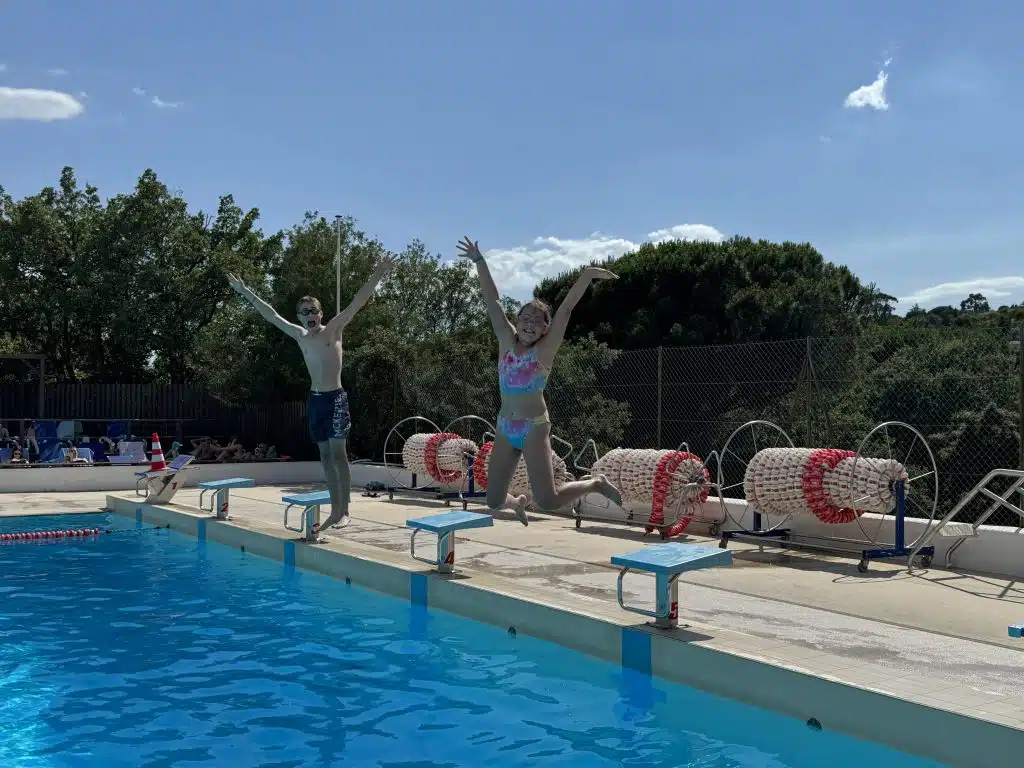 Eurocamp Holiday Review, Domaine des Naiades, Grimaud, France, frugal mum photo children jumping in pool