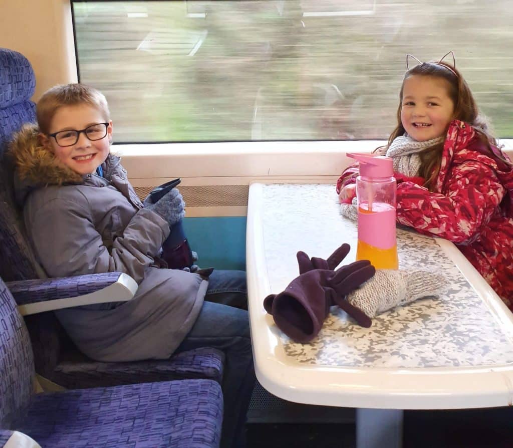 frugal mum children on train photo, london train offer kids for a quid