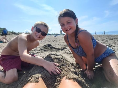 Tuscany beach, Eurocamp holiday review, kids, Italy, frugal mum children playing in sand, photo, camping village valle gaia