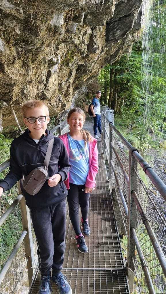Switzerland, Giessbach Falls Waterfall, Lake Brienz, children under waterfall photo, review