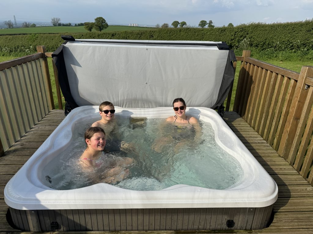 Knights Lodges, Bretby, Derbyshire, UK staycation review, photo of hot tub, frugal mum and children