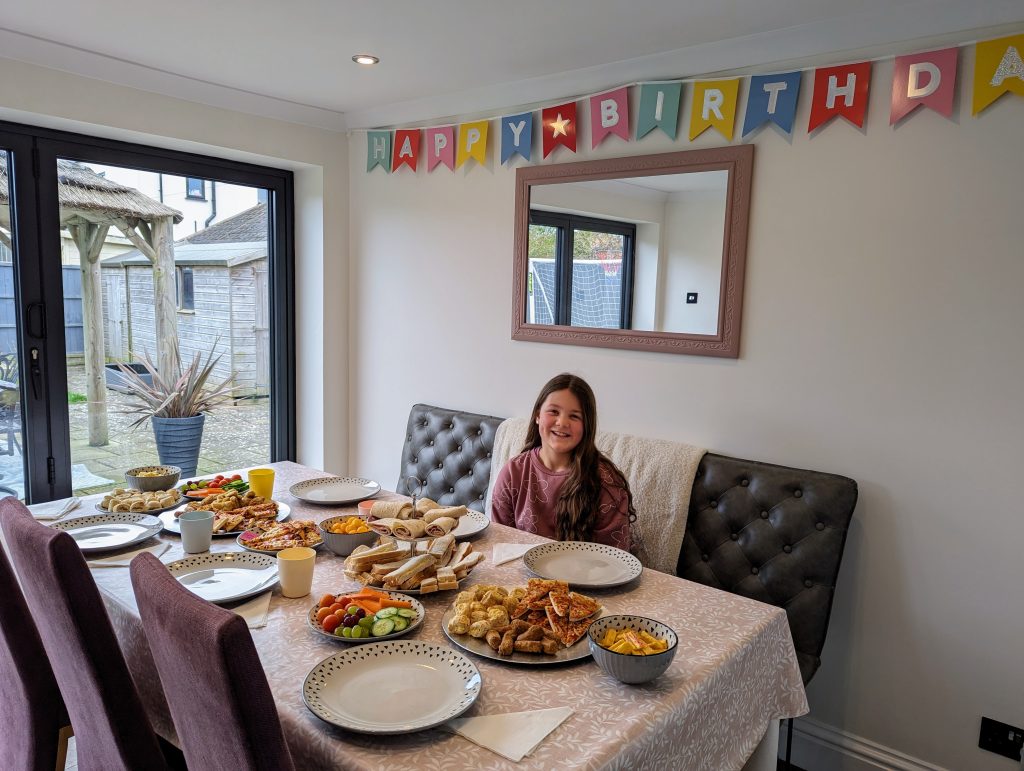 Family Frugal Living Guide, simple tips to save you money, frugal mum guide, photo of party at home