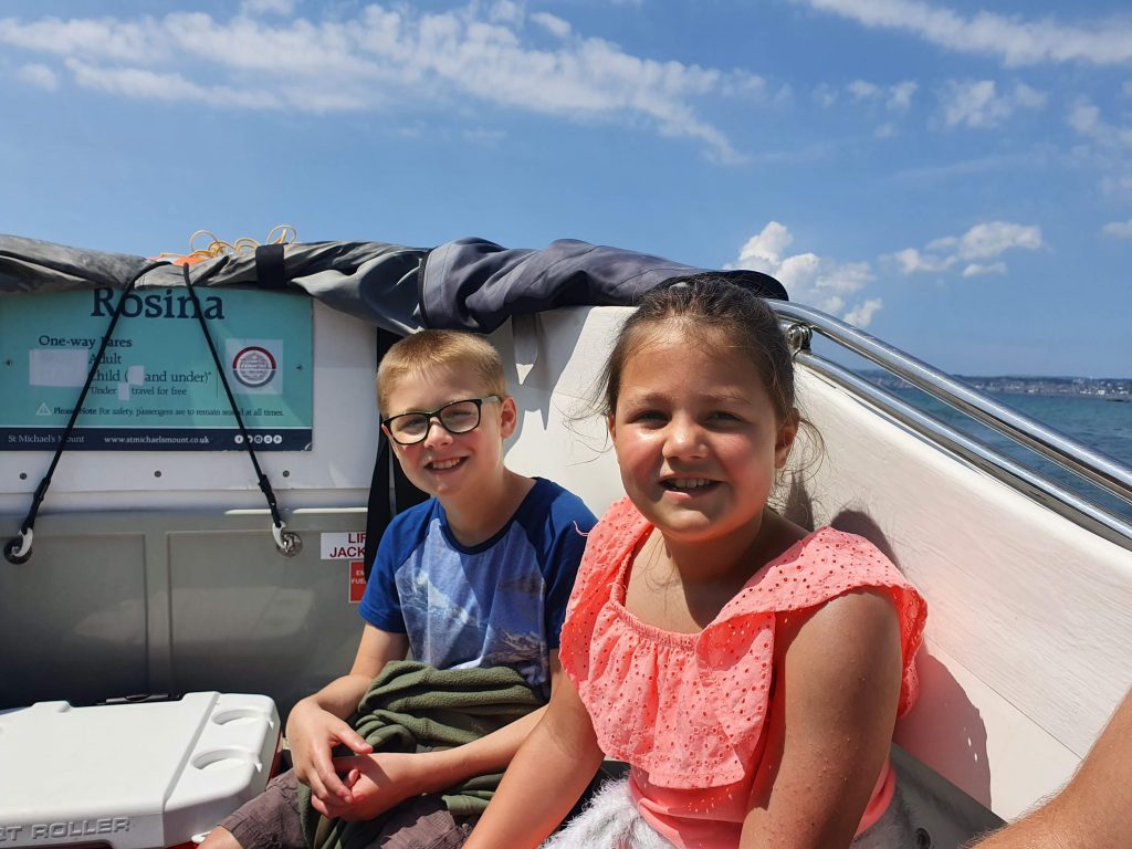 Cornwall family attractions, St Michael's Mount, National Trust, photo of frugal mum children on speed boat, review