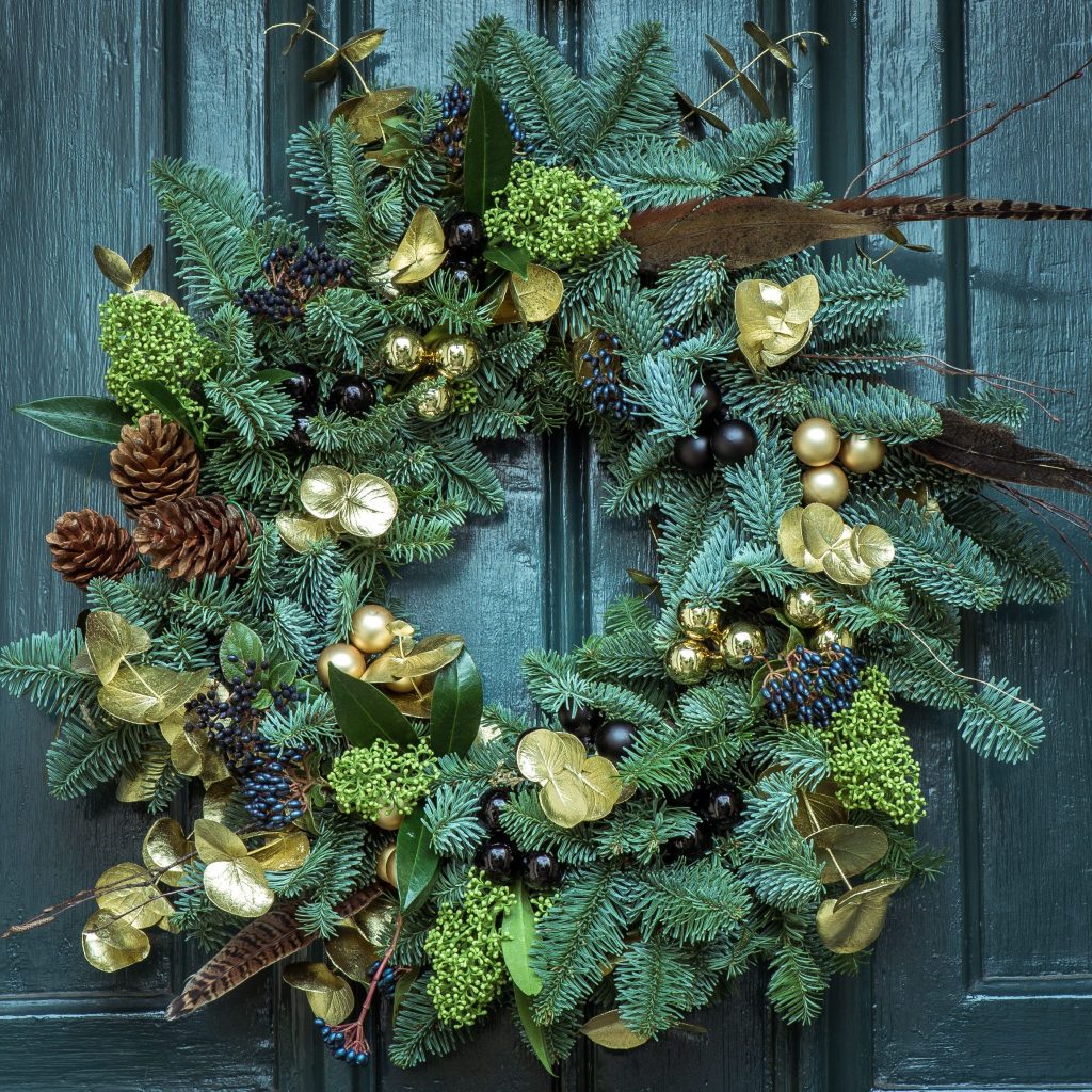 christmas natural wreath on door